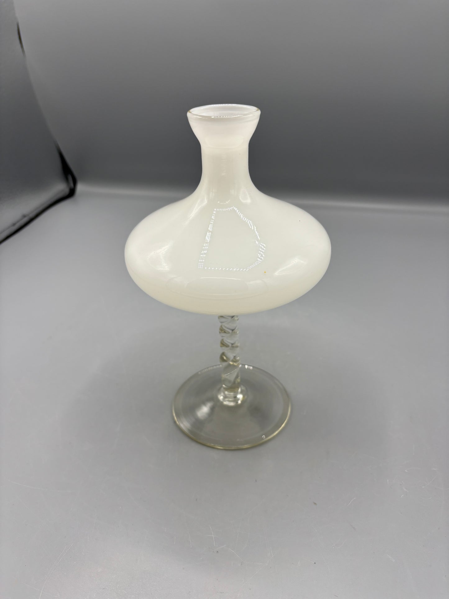 White Opalescent glass vase with a twisted stem