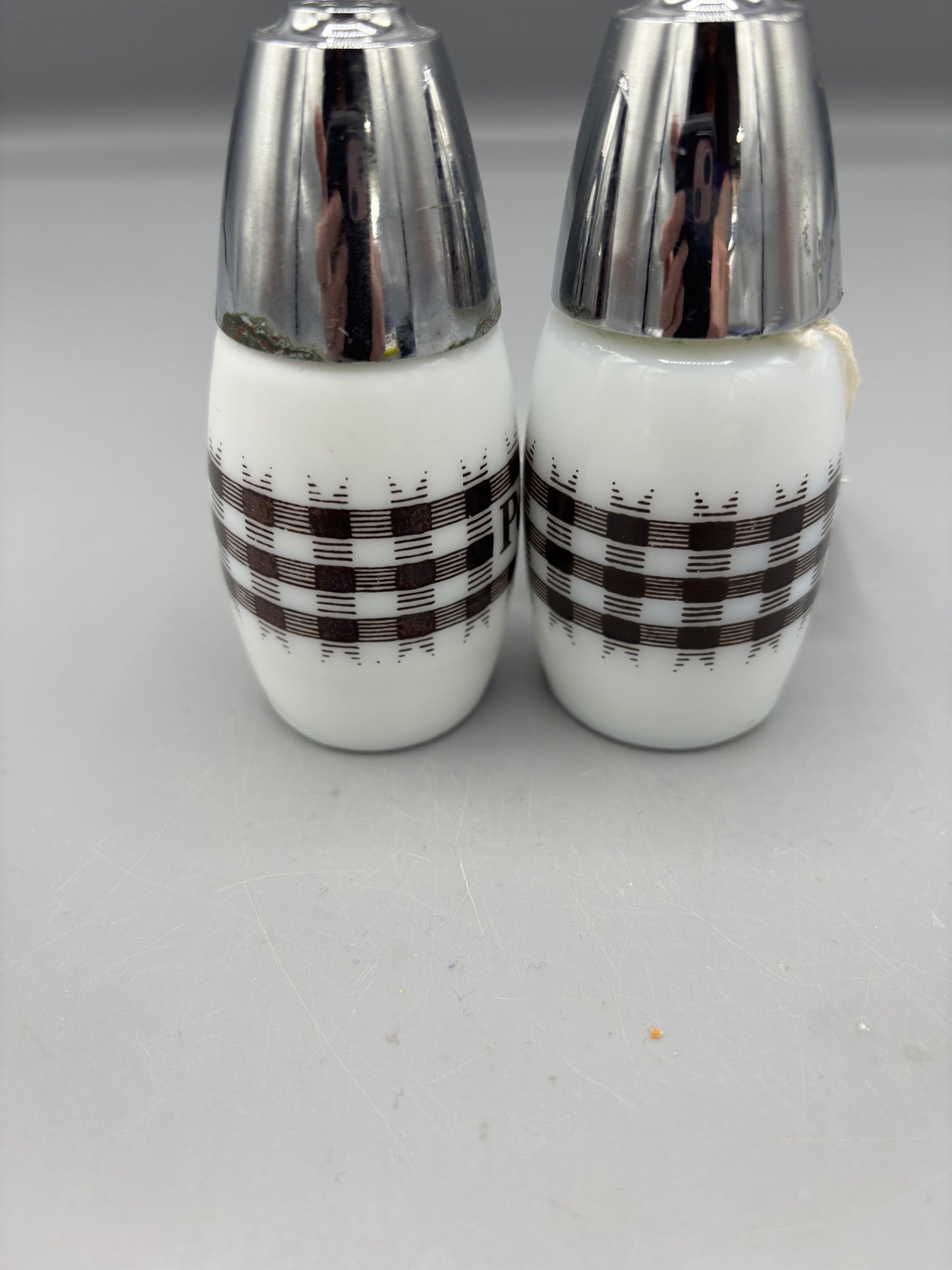 Corning ware black and white salt & peppers shakers