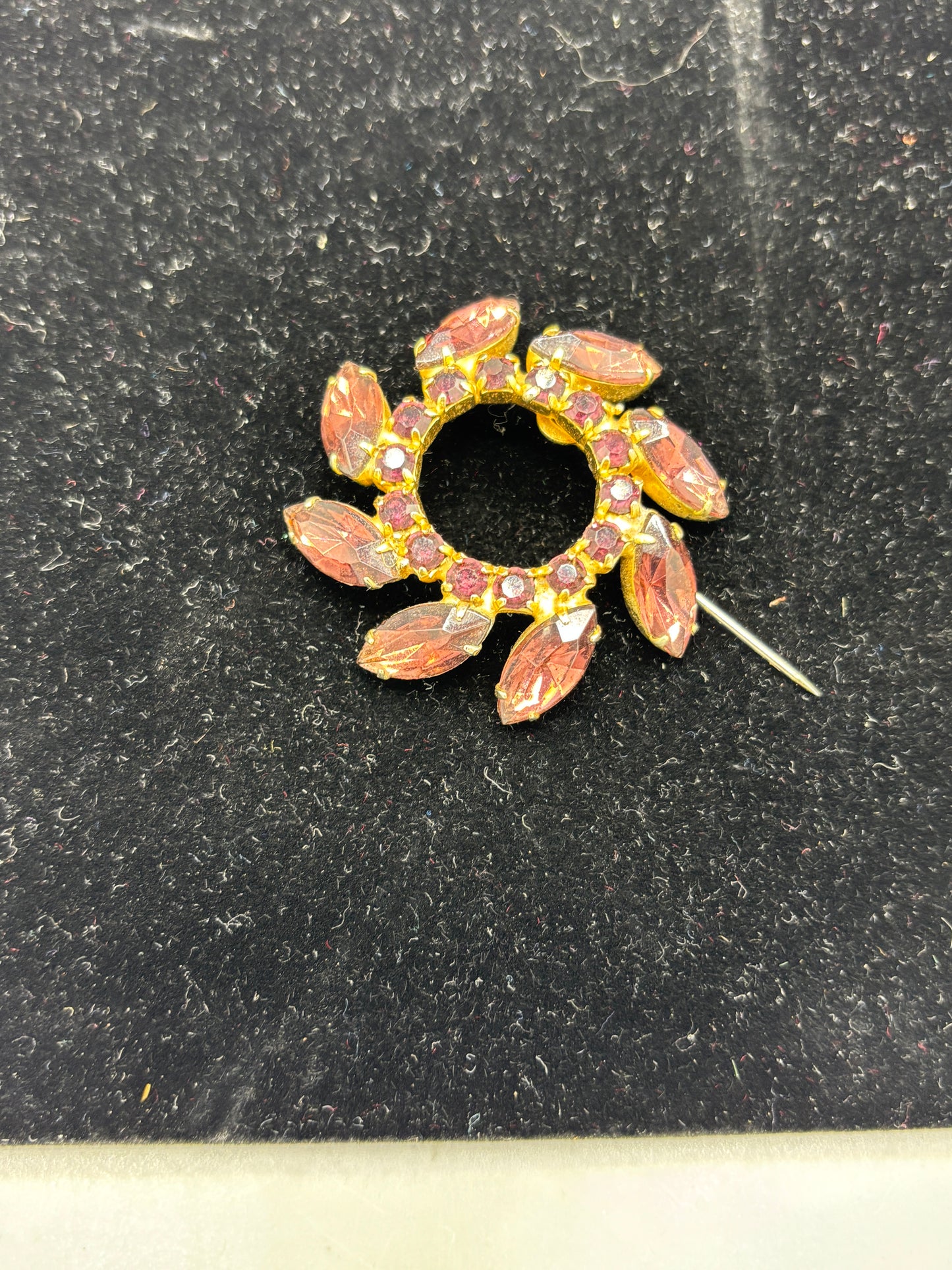 Vintage gold tone purple crystal circle brooch