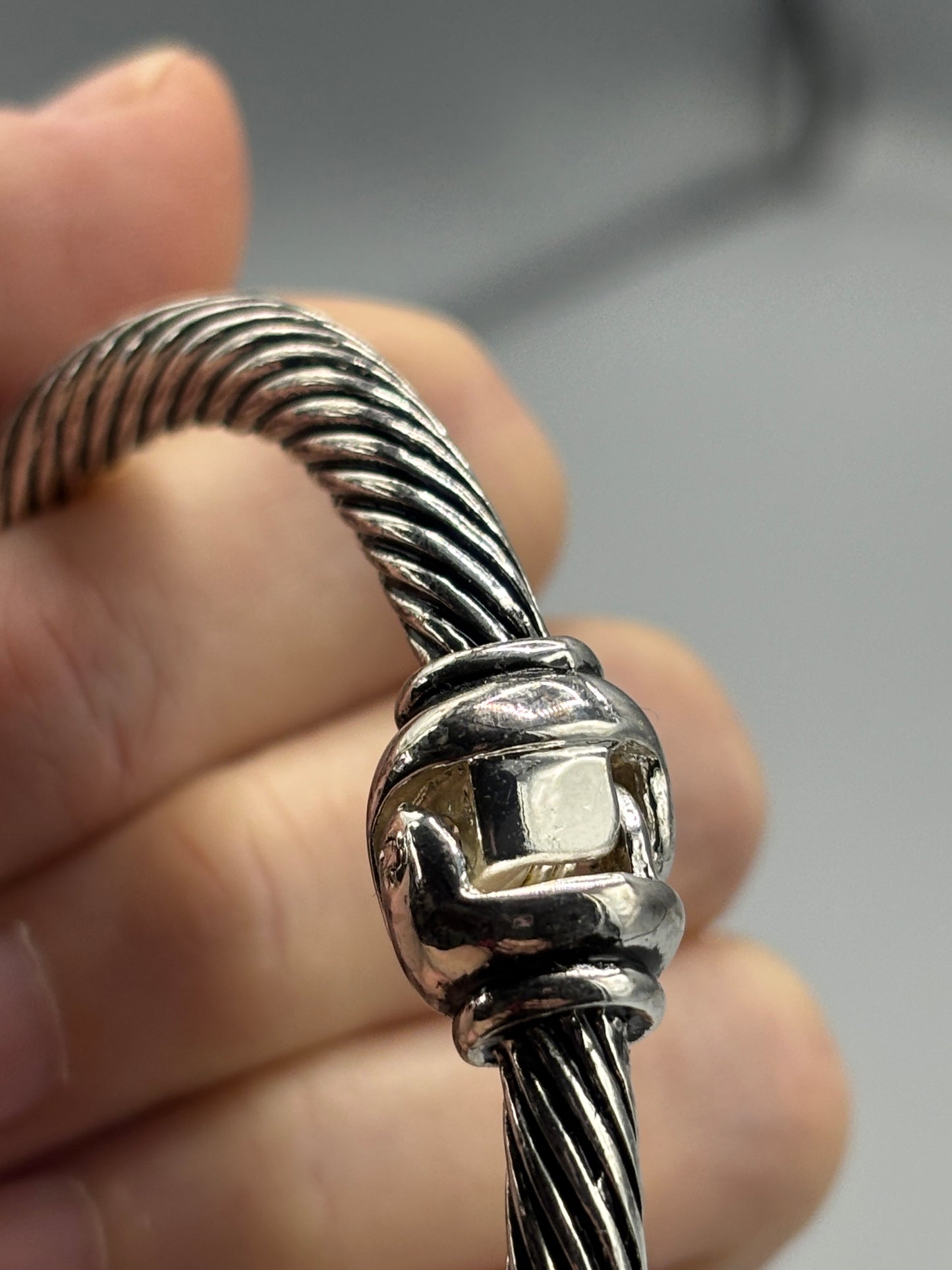 Silver tone cable style bypass bangle with pearl