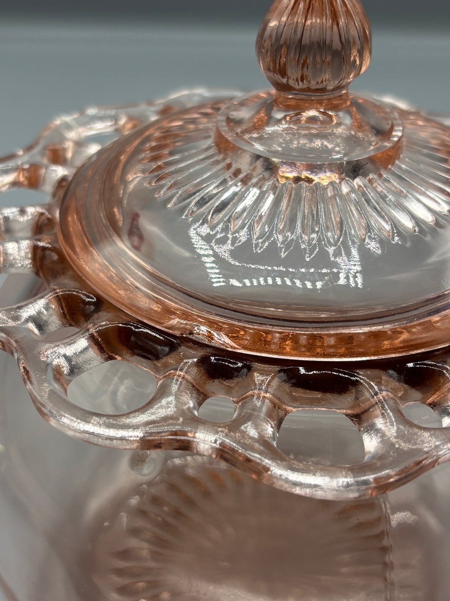 Vintage pink depression glass cookie jar with lid