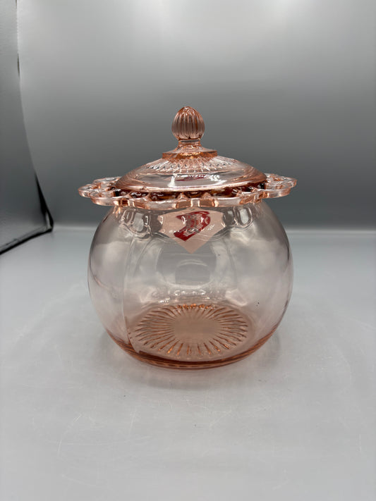Vintage pink depression glass cookie jar with lid