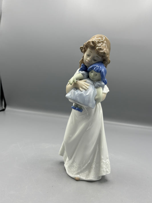 Nao by Lladro girl with doll "We're sleepy"