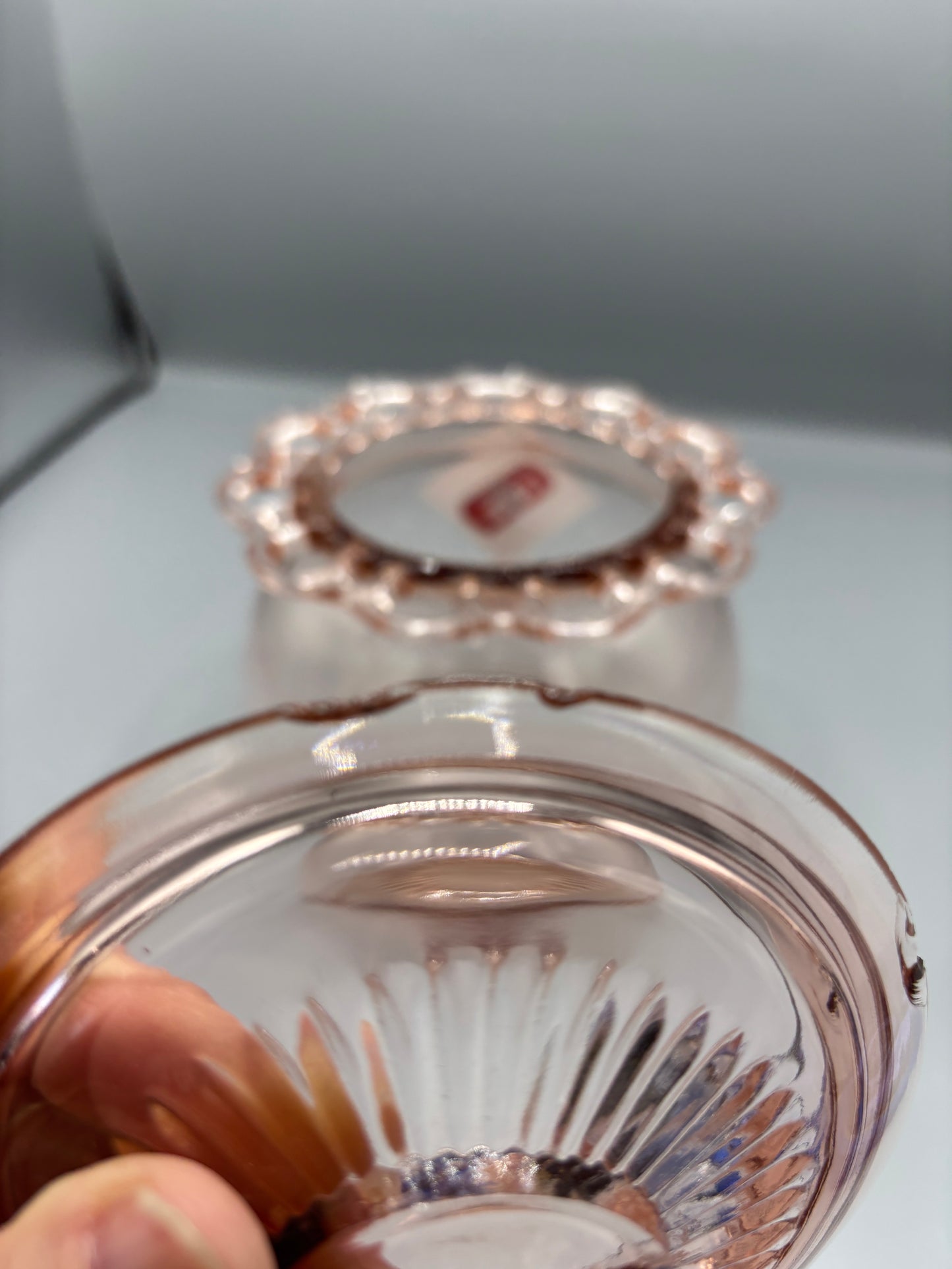 Vintage pink depression glass cookie jar with lid