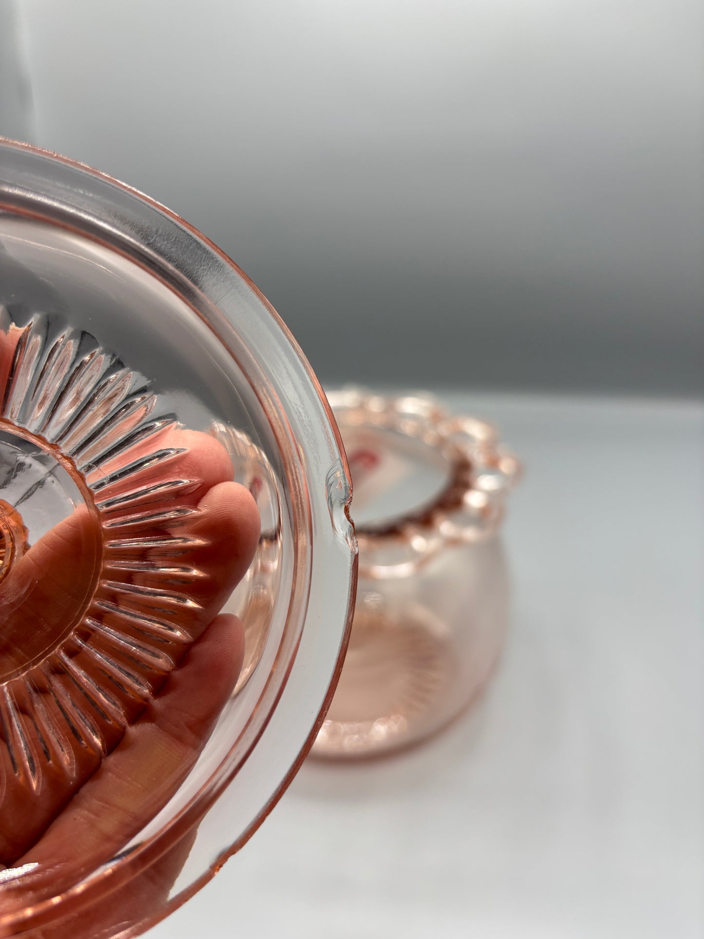 Vintage pink depression glass cookie jar with lid