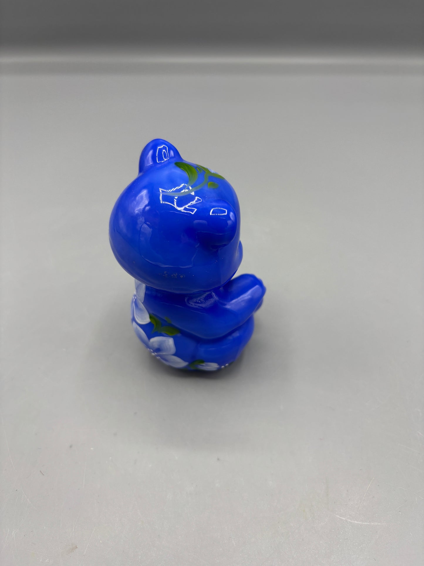 Fenton blue sitting bear with flowers