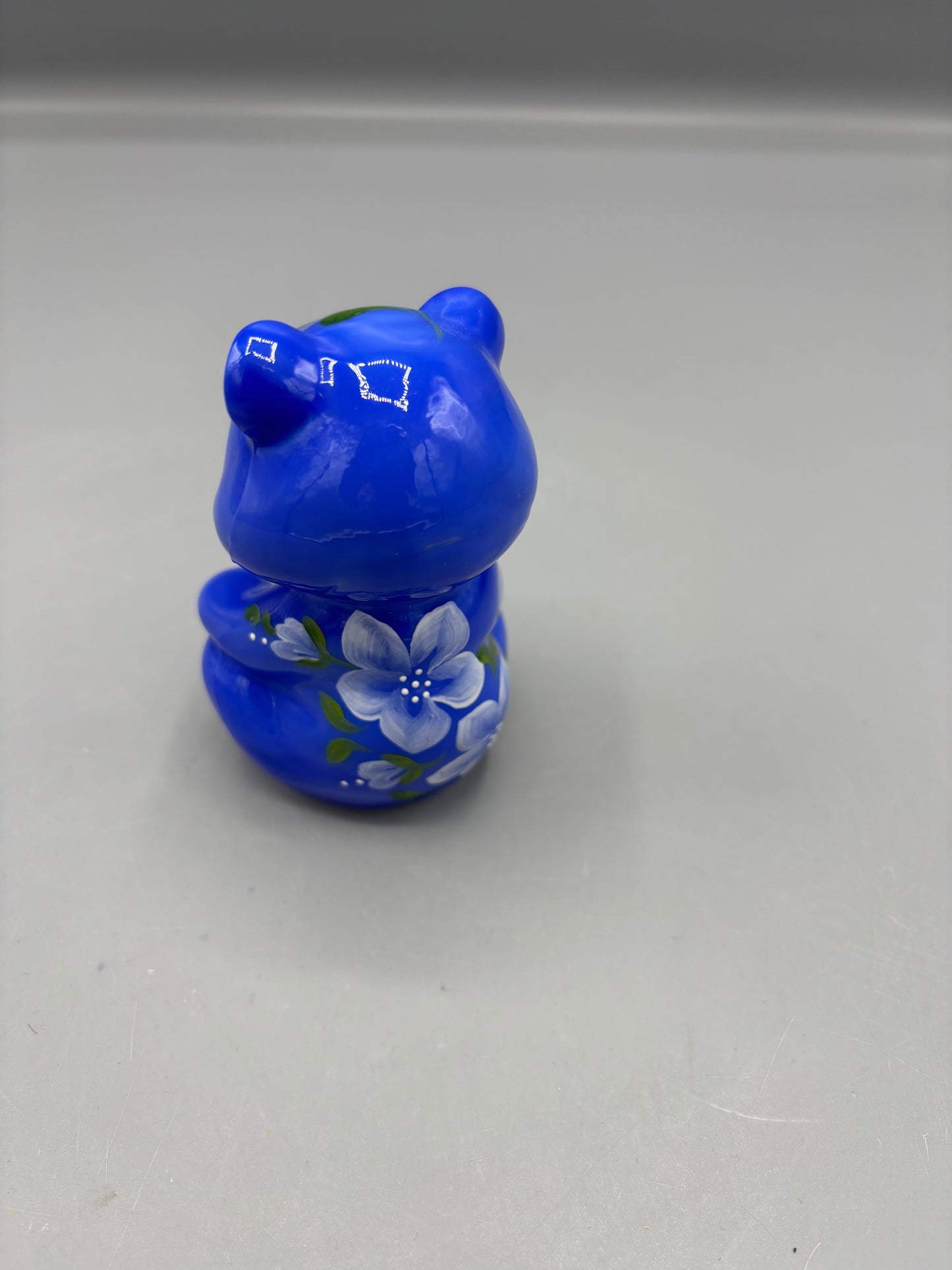 Fenton blue sitting bear with flowers
