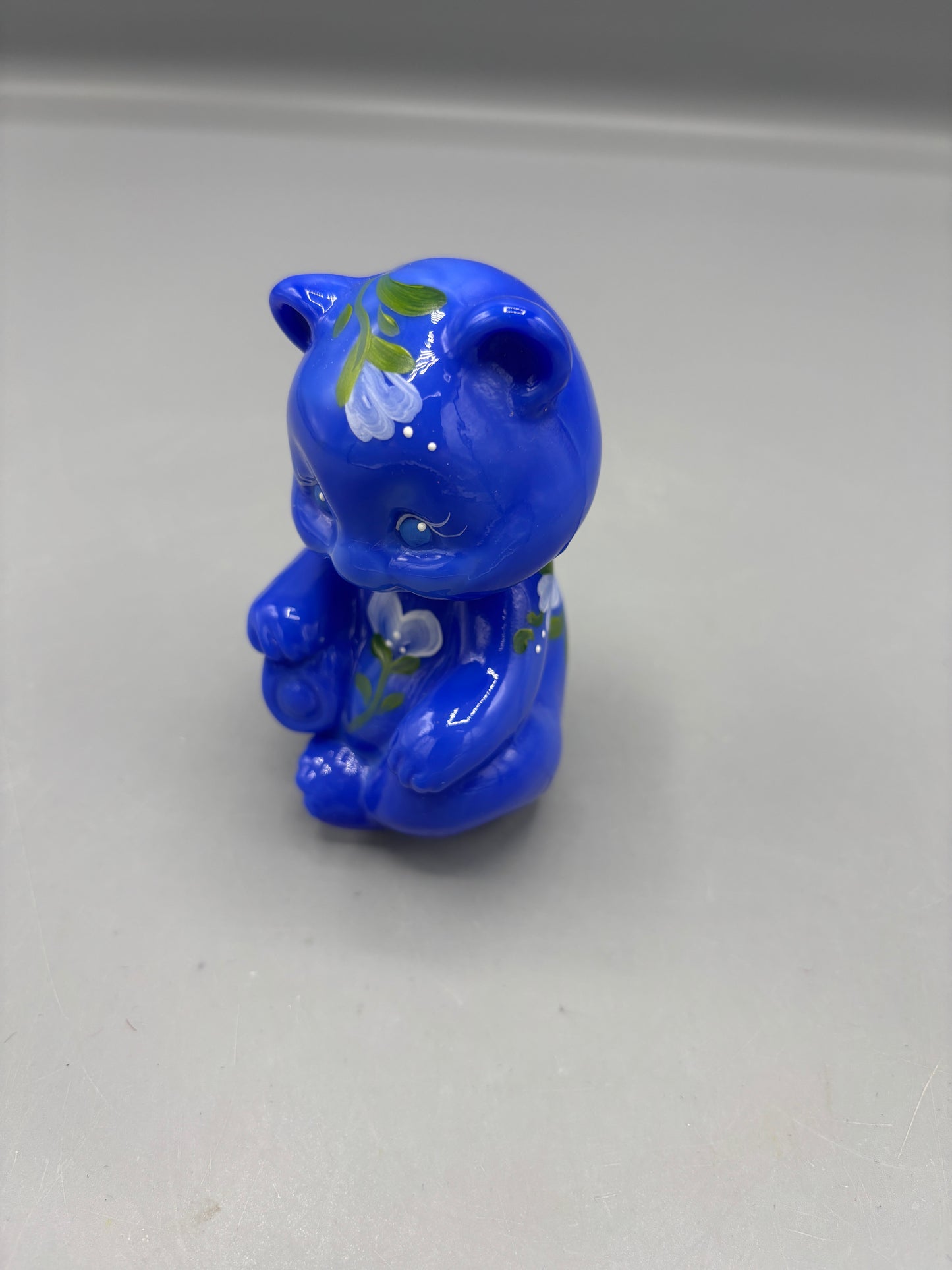 Fenton blue sitting bear with flowers