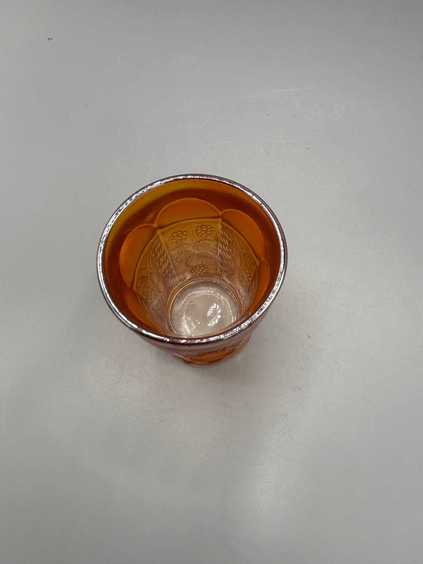 Fenton Marigold iridescent tumbler with grape & leaf