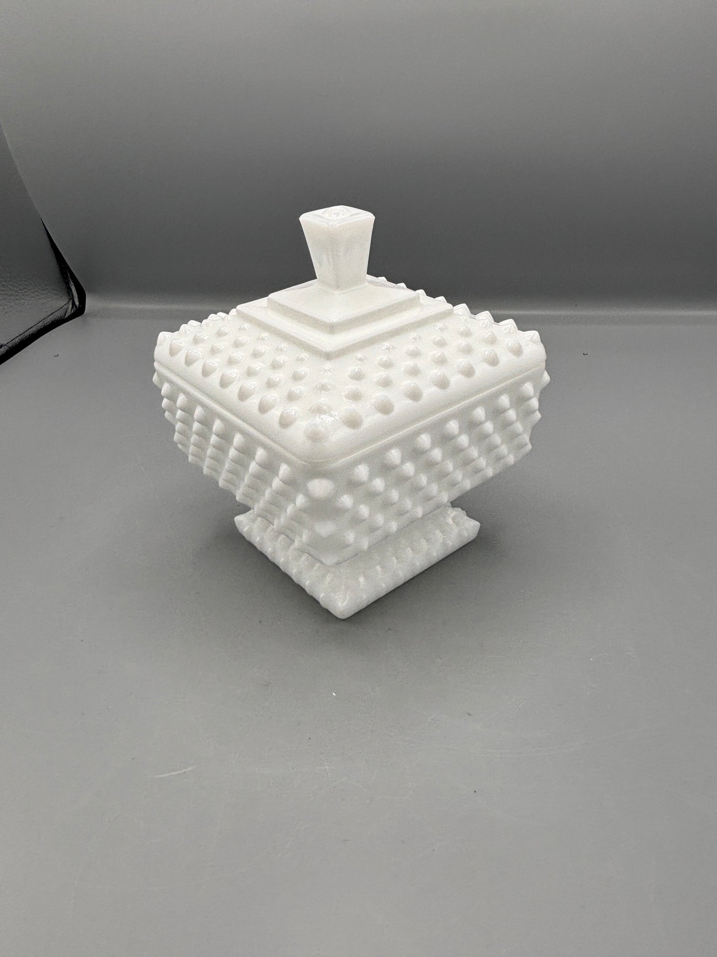 Fenton hobnail milk glass lidded square footed jar