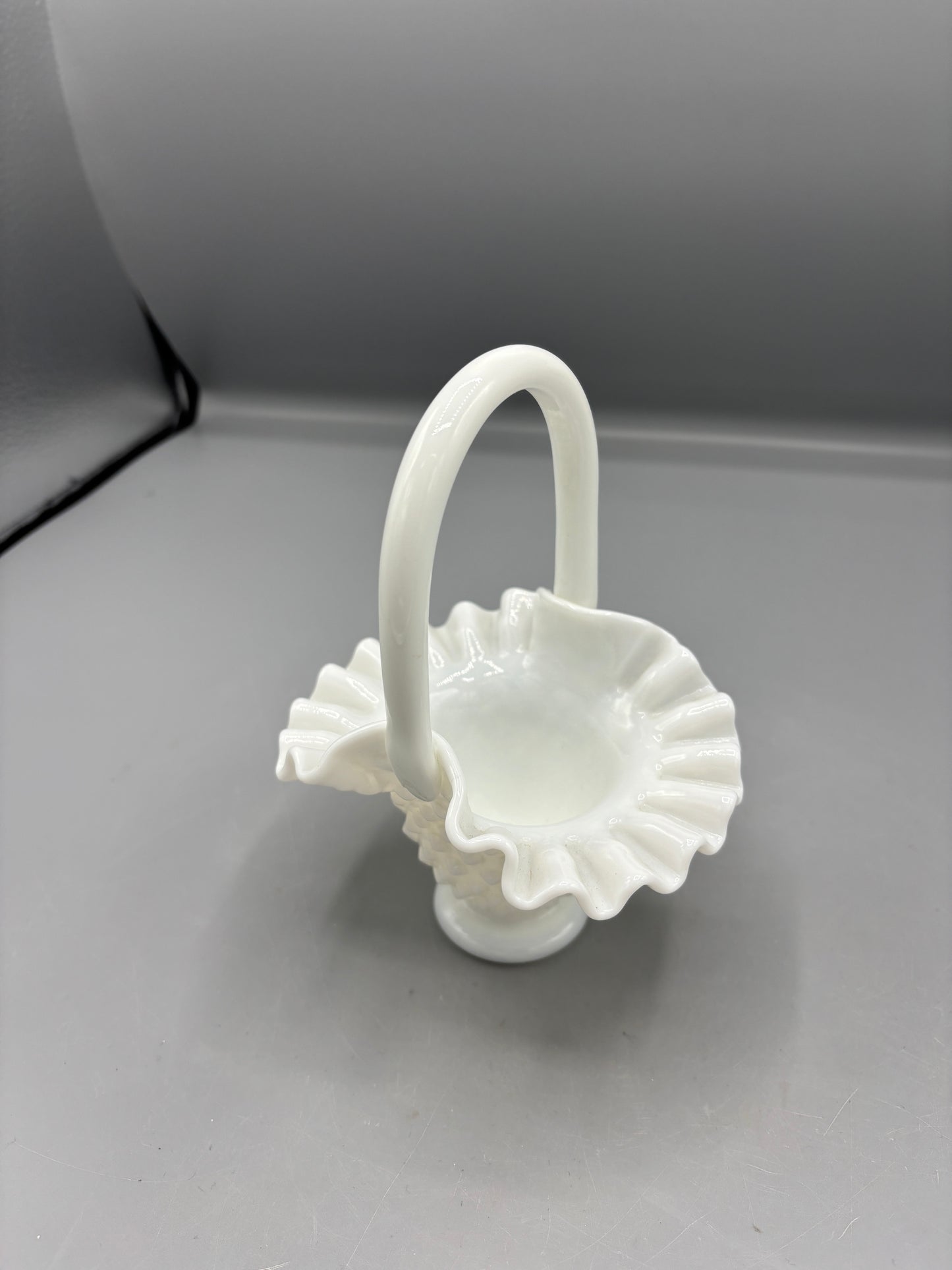 White Fenton hobnail basket with ruffled rim