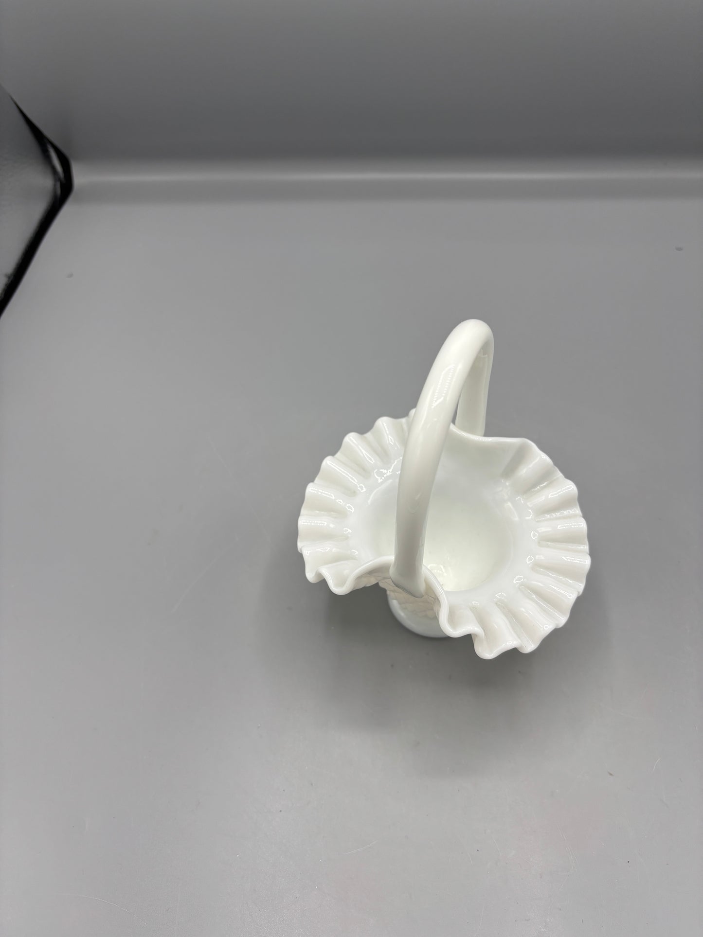 White Fenton hobnail basket with ruffled rim
