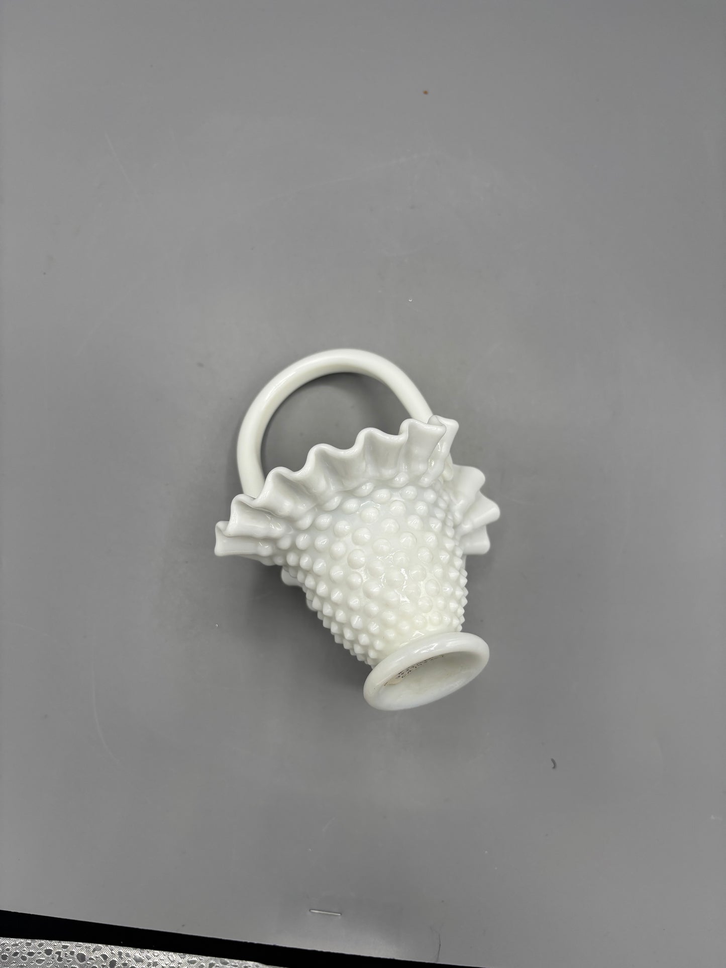 White Fenton hobnail basket with ruffled rim