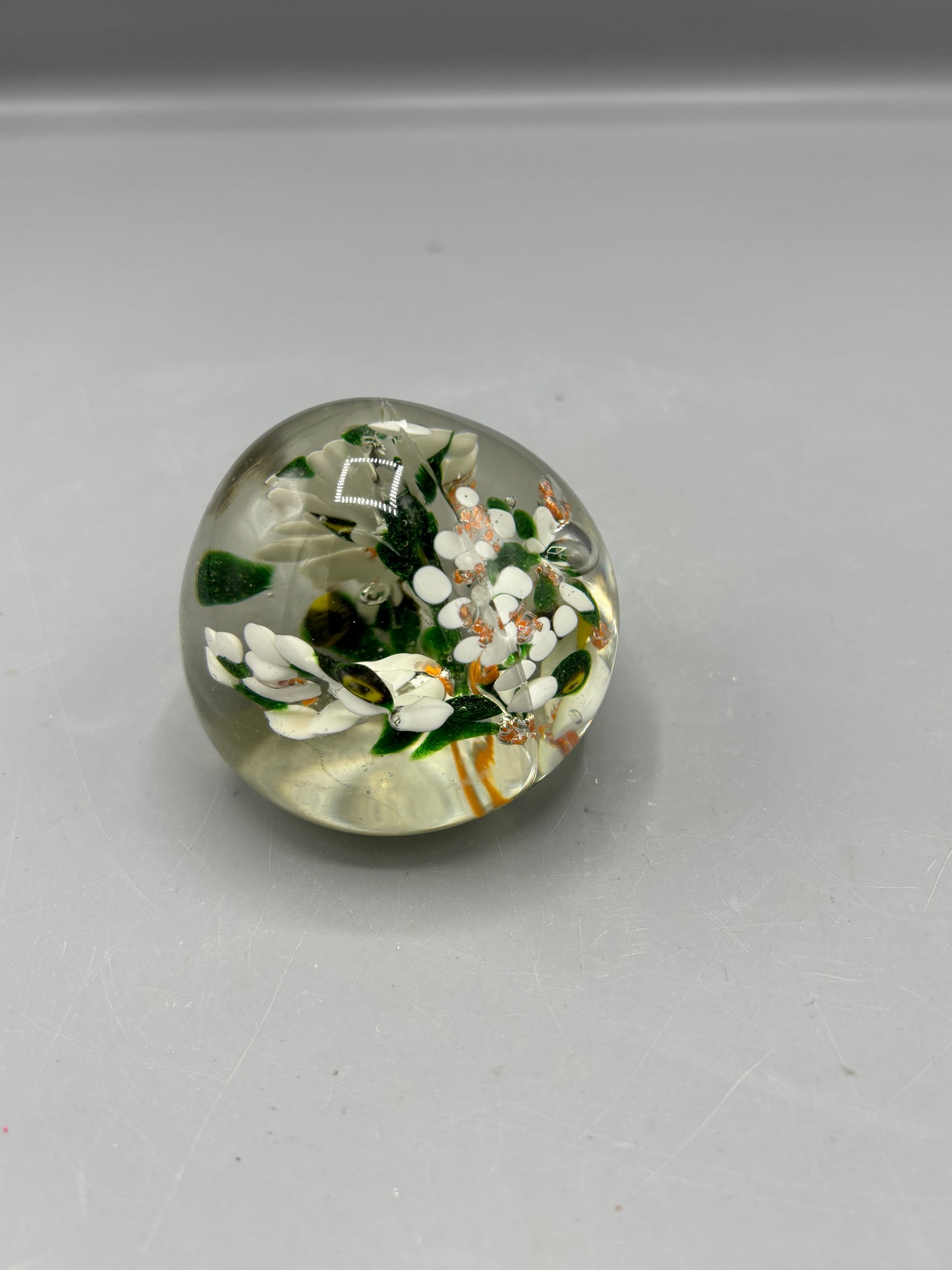 Paperweight with white flowers