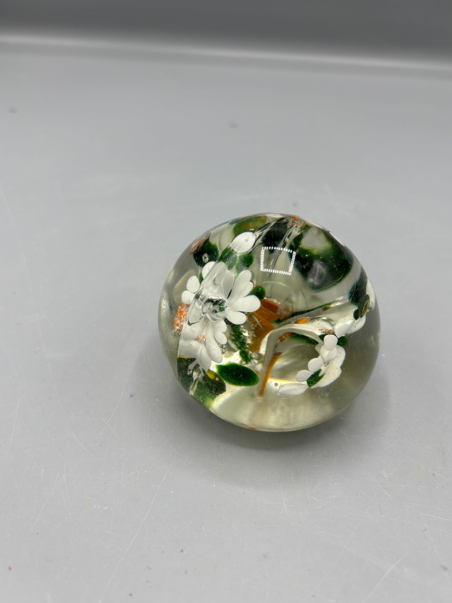 Paperweight with white flowers