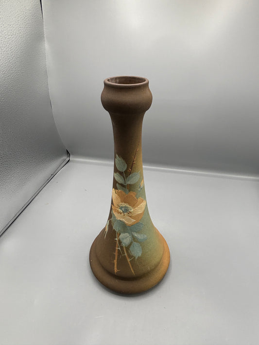 Brown vase with flowers