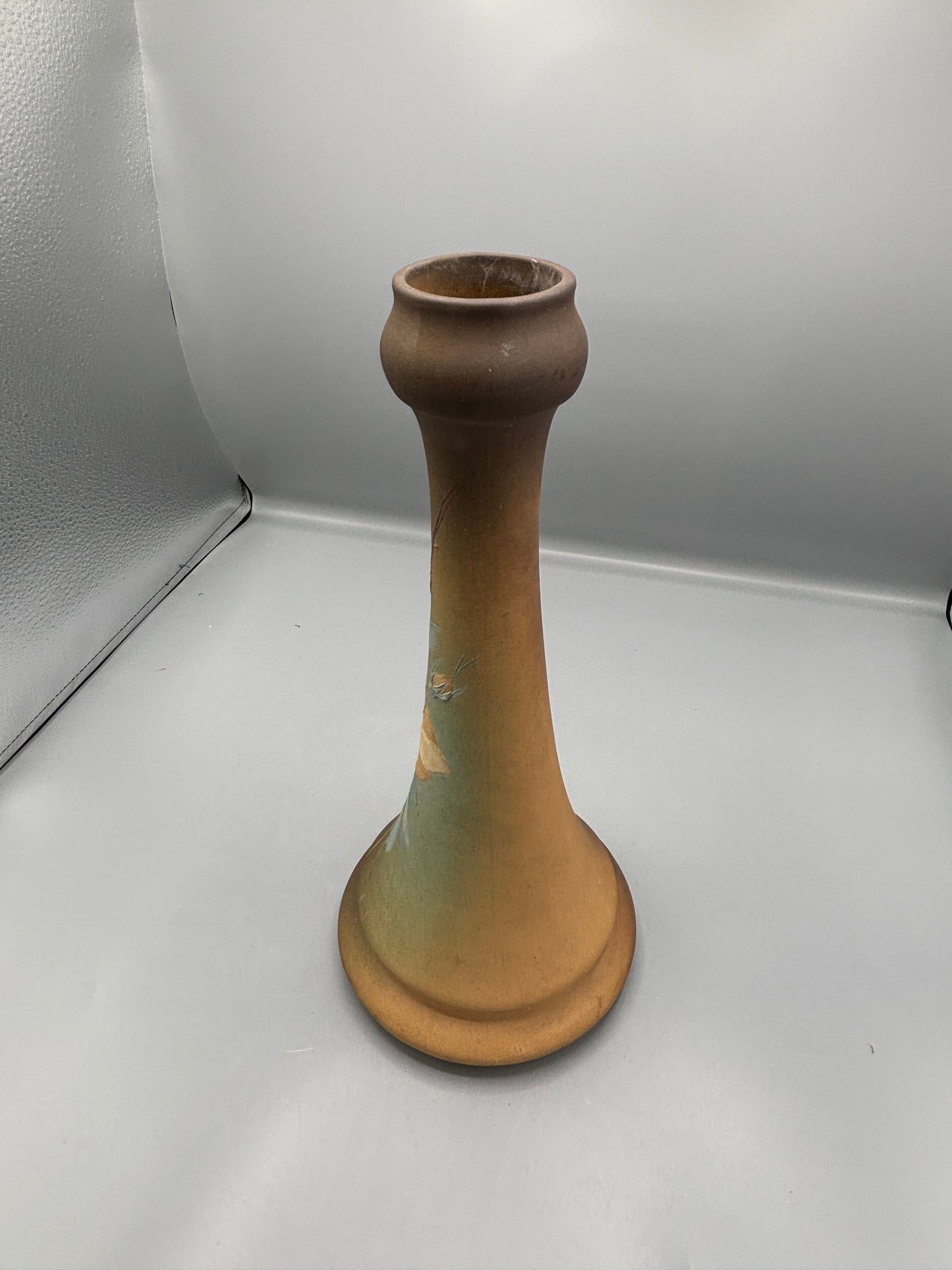Brown vase with flowers