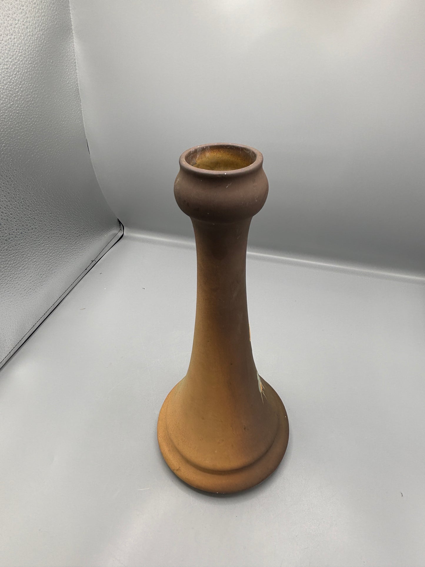 Brown vase with flowers