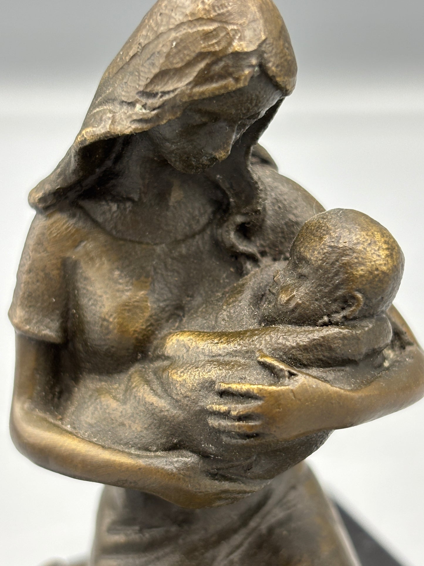 Vintage Bronze "Milo" Mothers embrace on black marble