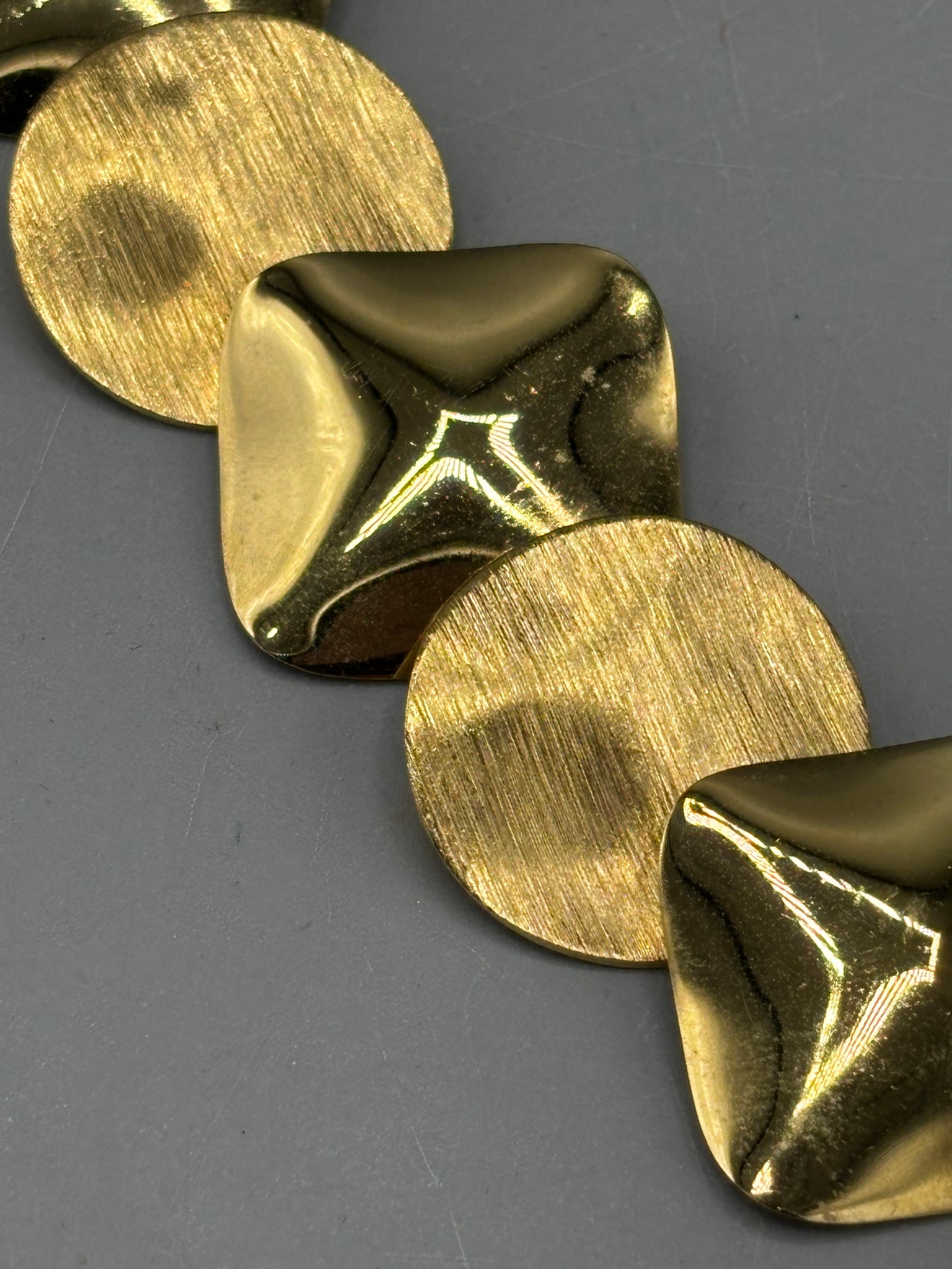 Gold tone disc necklace