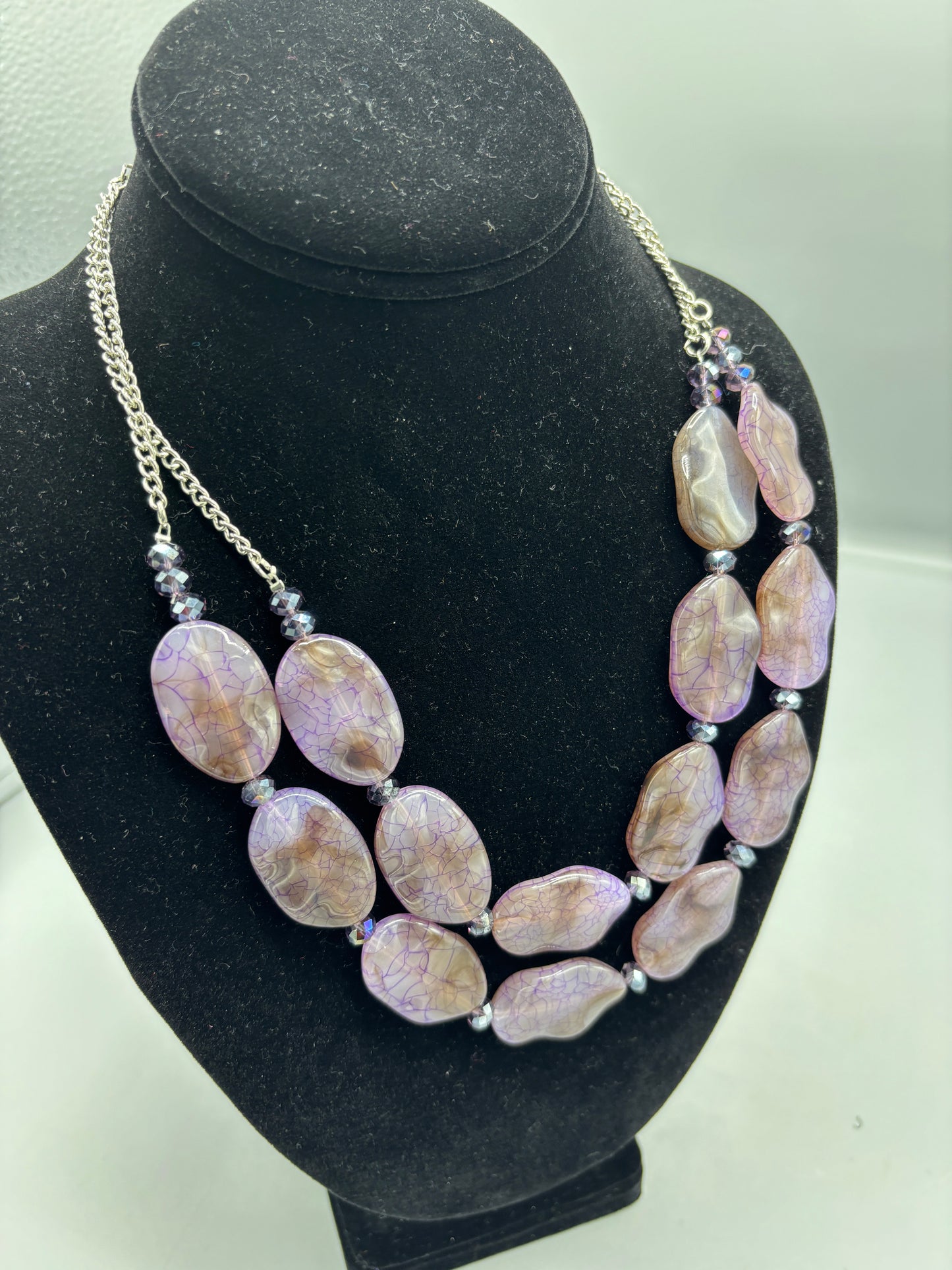 Purple plastic bead
