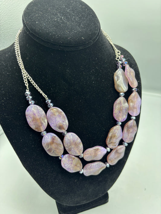 Purple plastic bead