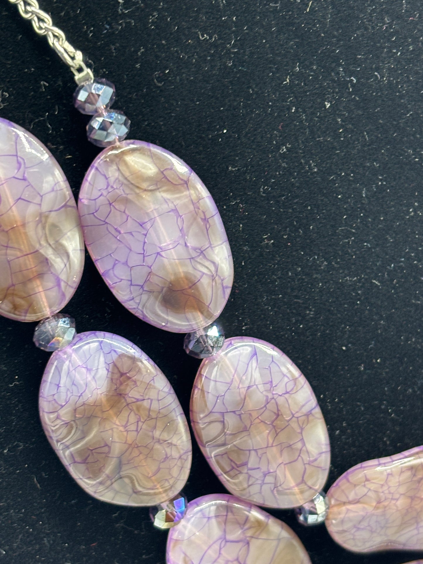 Purple plastic bead