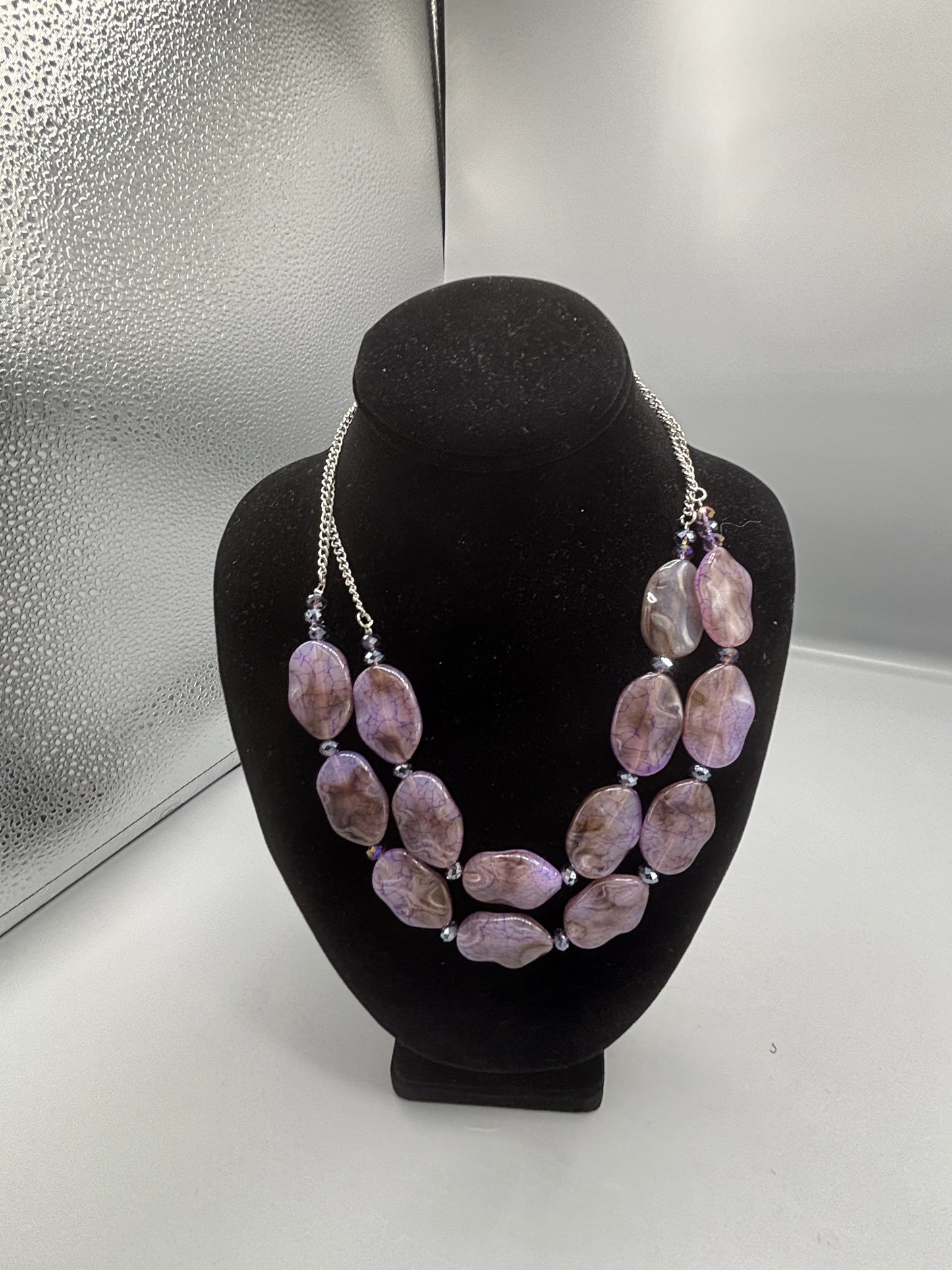 Purple plastic bead
