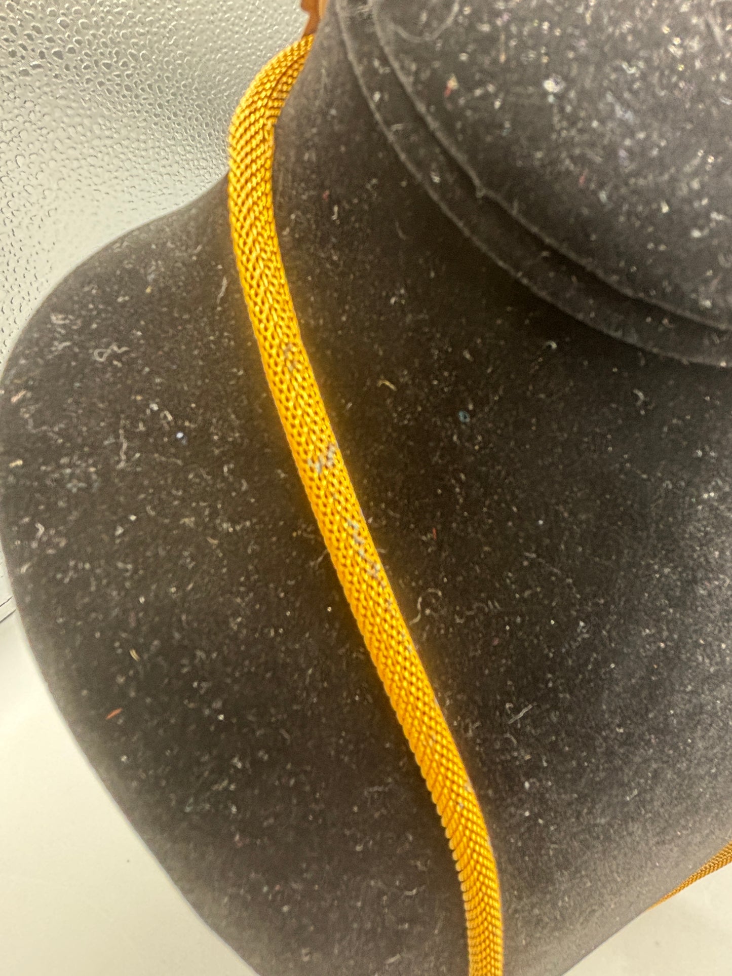 Miriam Haskell gold tone mesh with blue stone