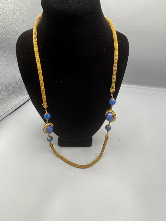 Miriam Haskell gold tone mesh with blue stone