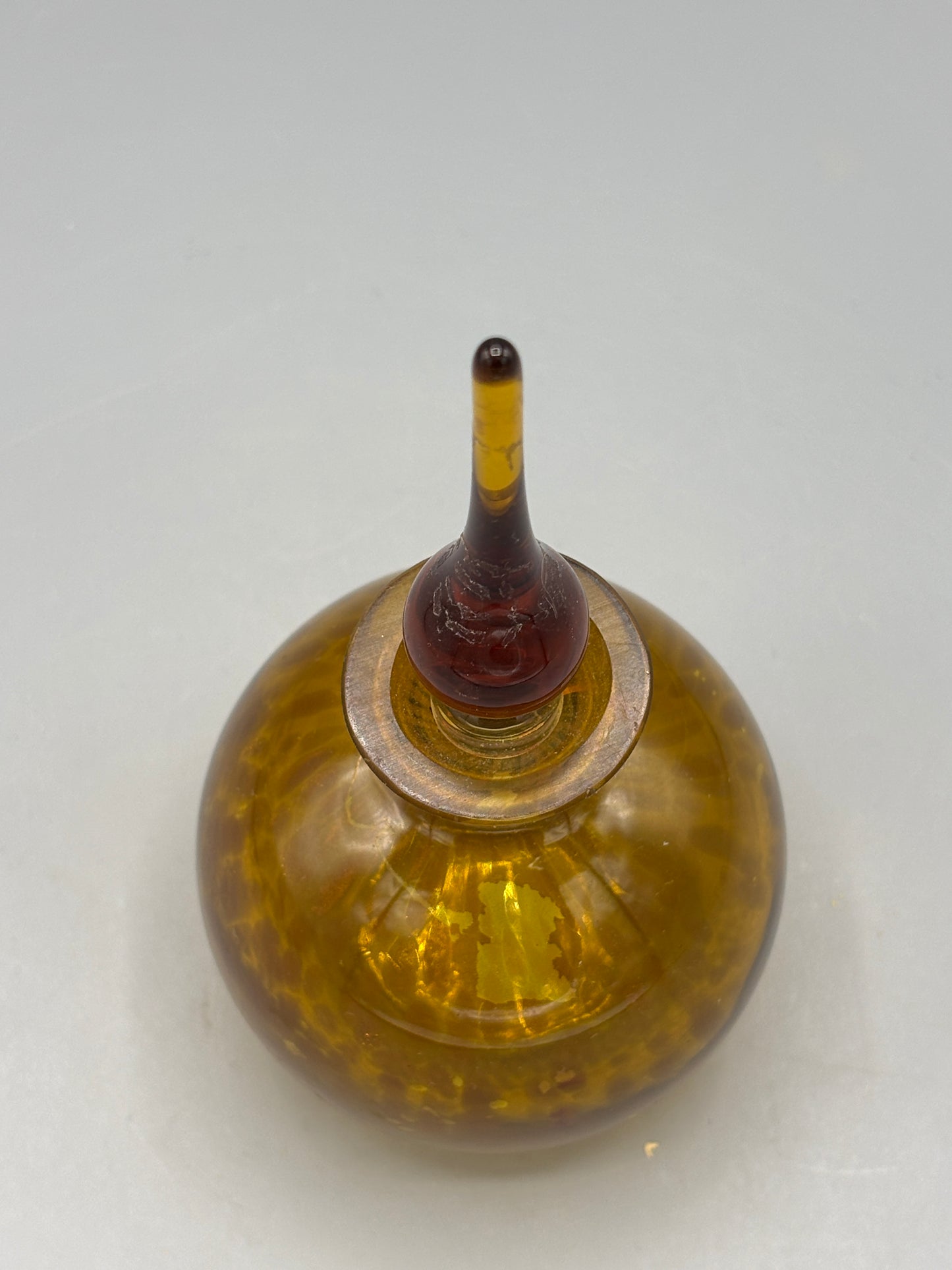 Brown perfume bottle with stopper