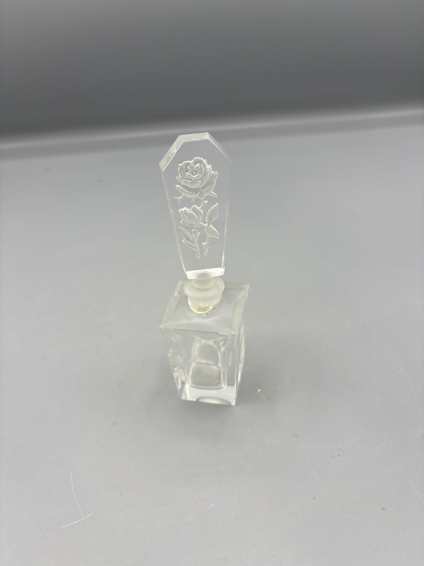 Vintage hand blown perfume bottle etched with roses