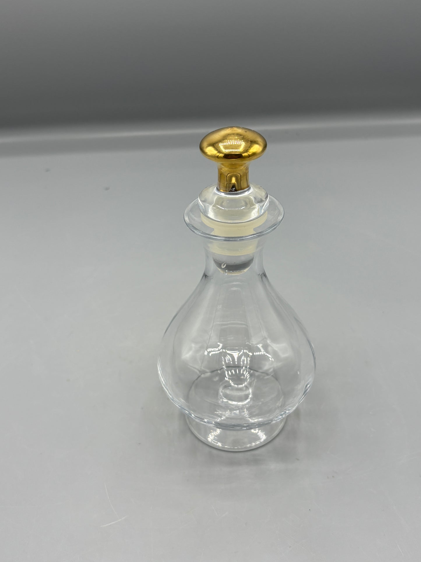 Hand blown glass  perfume bottle with gold stopper
