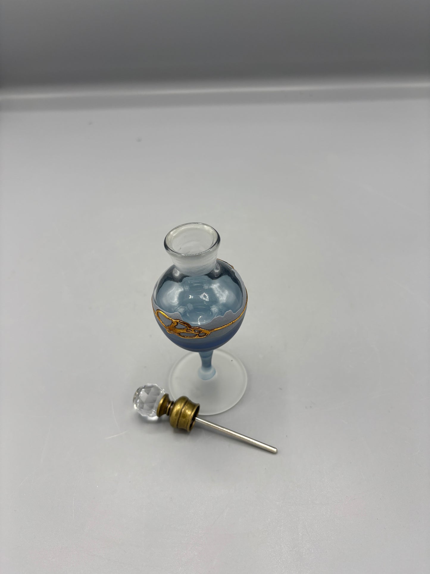 Egyptian glass blue perfume bottle