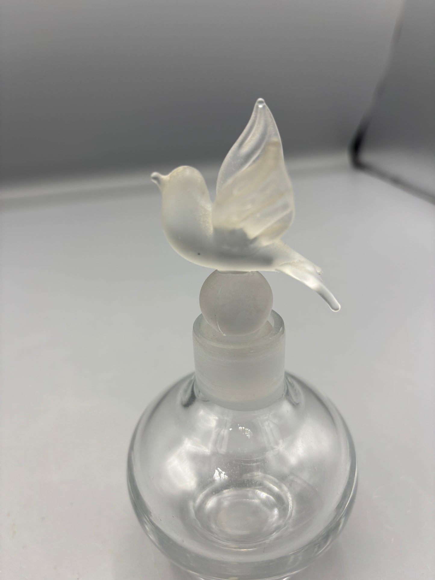 Irving W Rice Perfume bottle with frosted Dove stopper