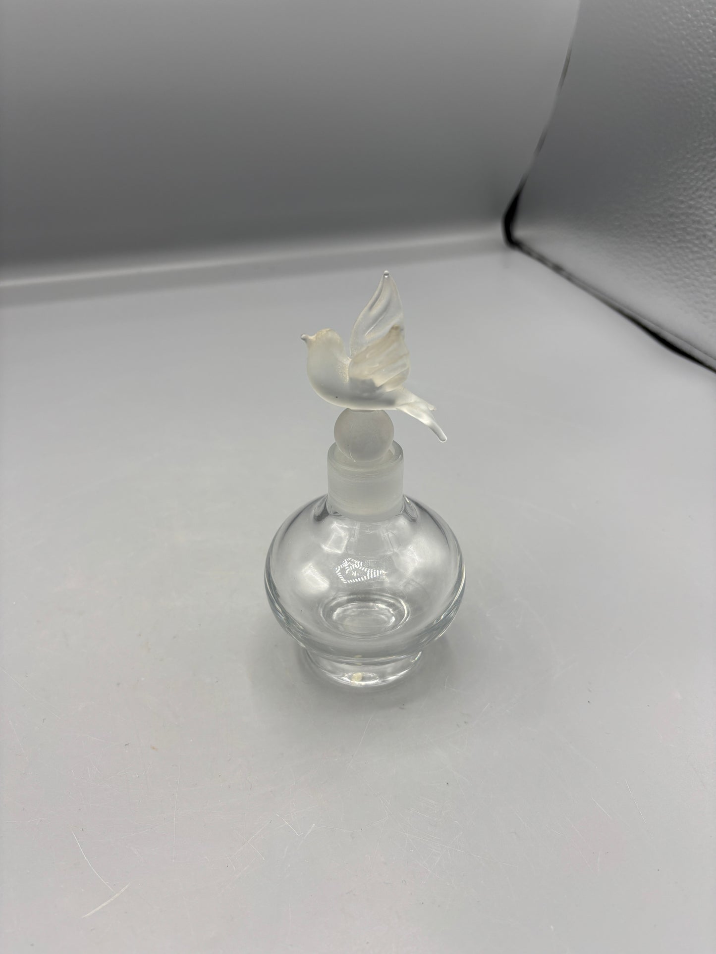 Irving W Rice Perfume bottle with frosted Dove stopper