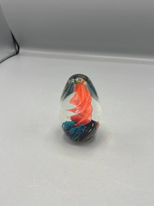 Art glass  egg with red swirl