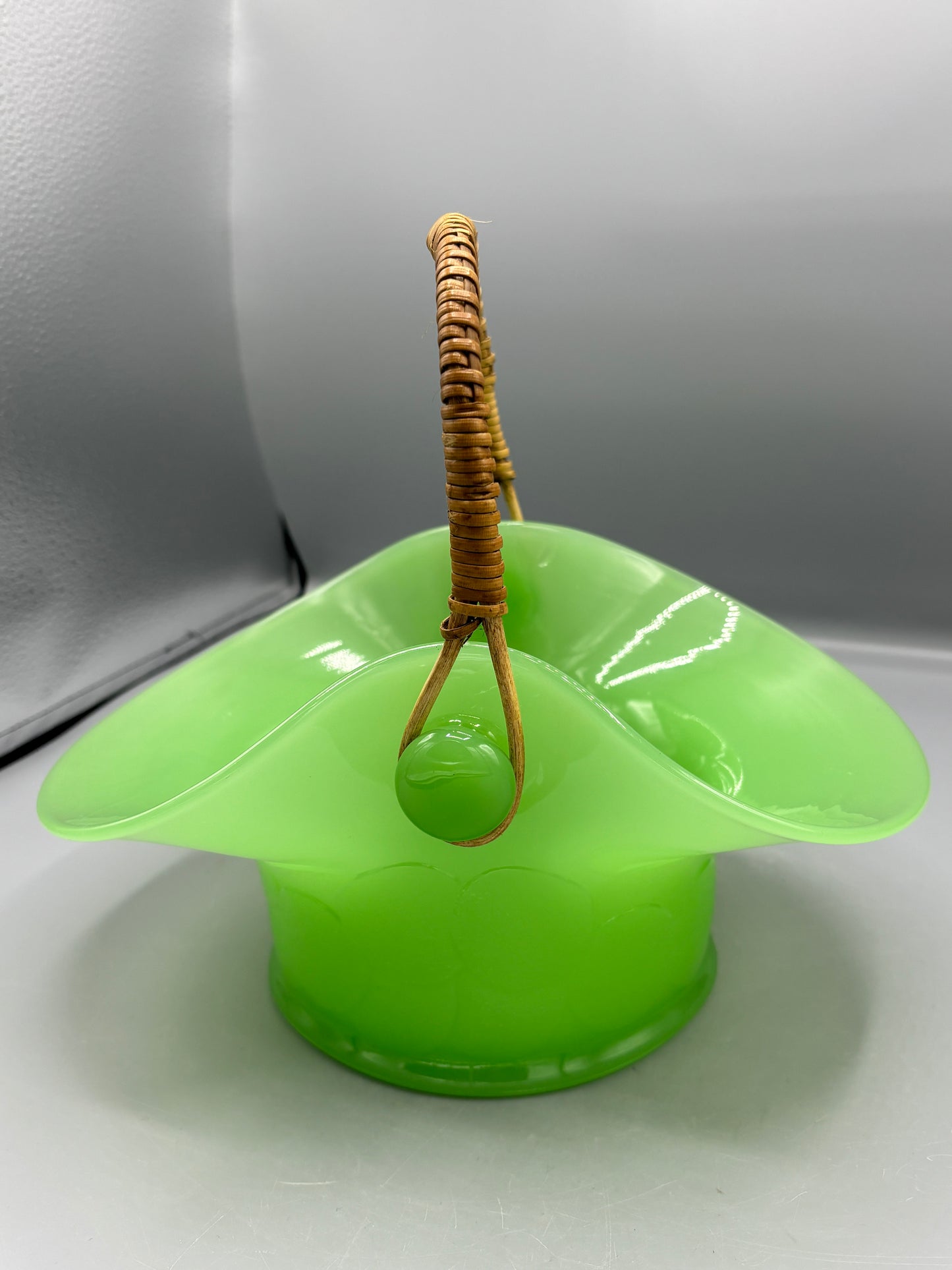 Vintage Fenton Jadeite basket with wicker handle
