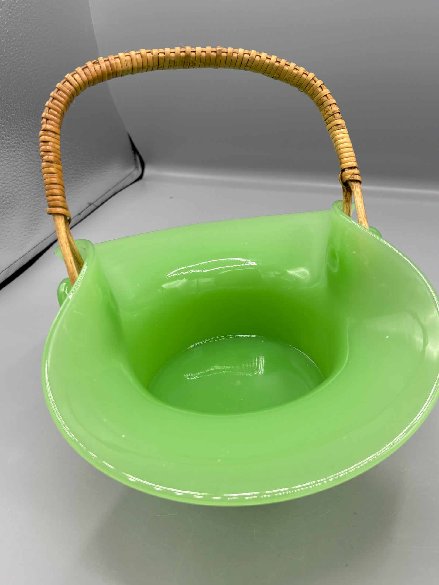 Vintage Fenton Jadeite basket with wicker handle