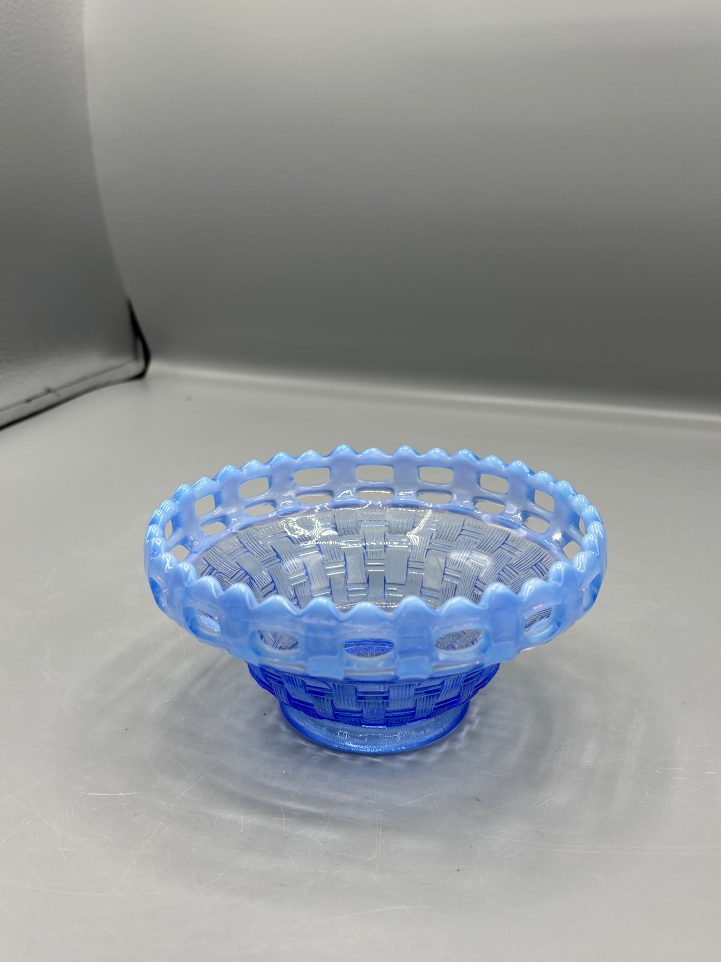Vintage Fenton opalescent blue glass basket