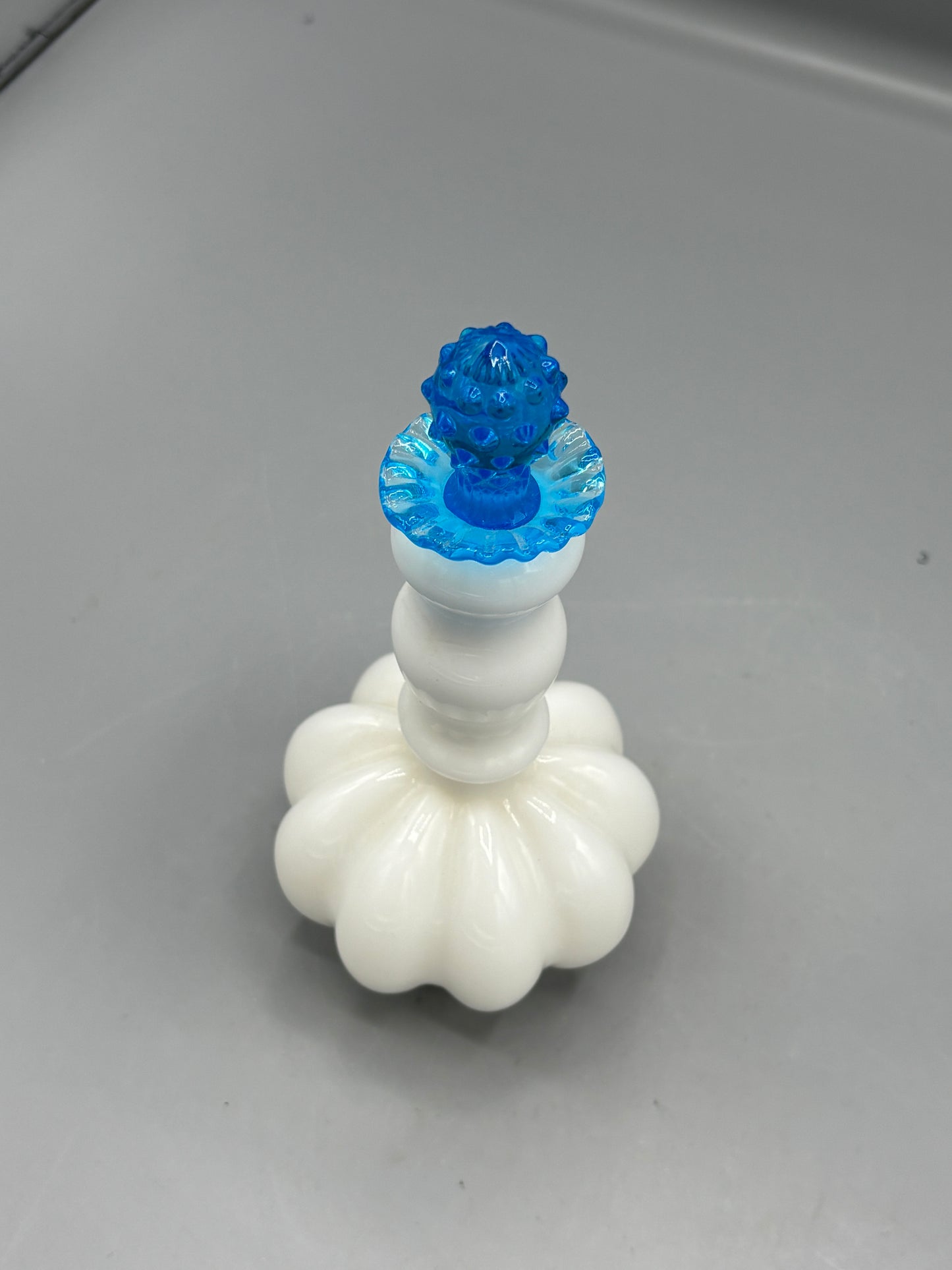 Vintage Fenton milk glass perfume bottle w/ blue stopper