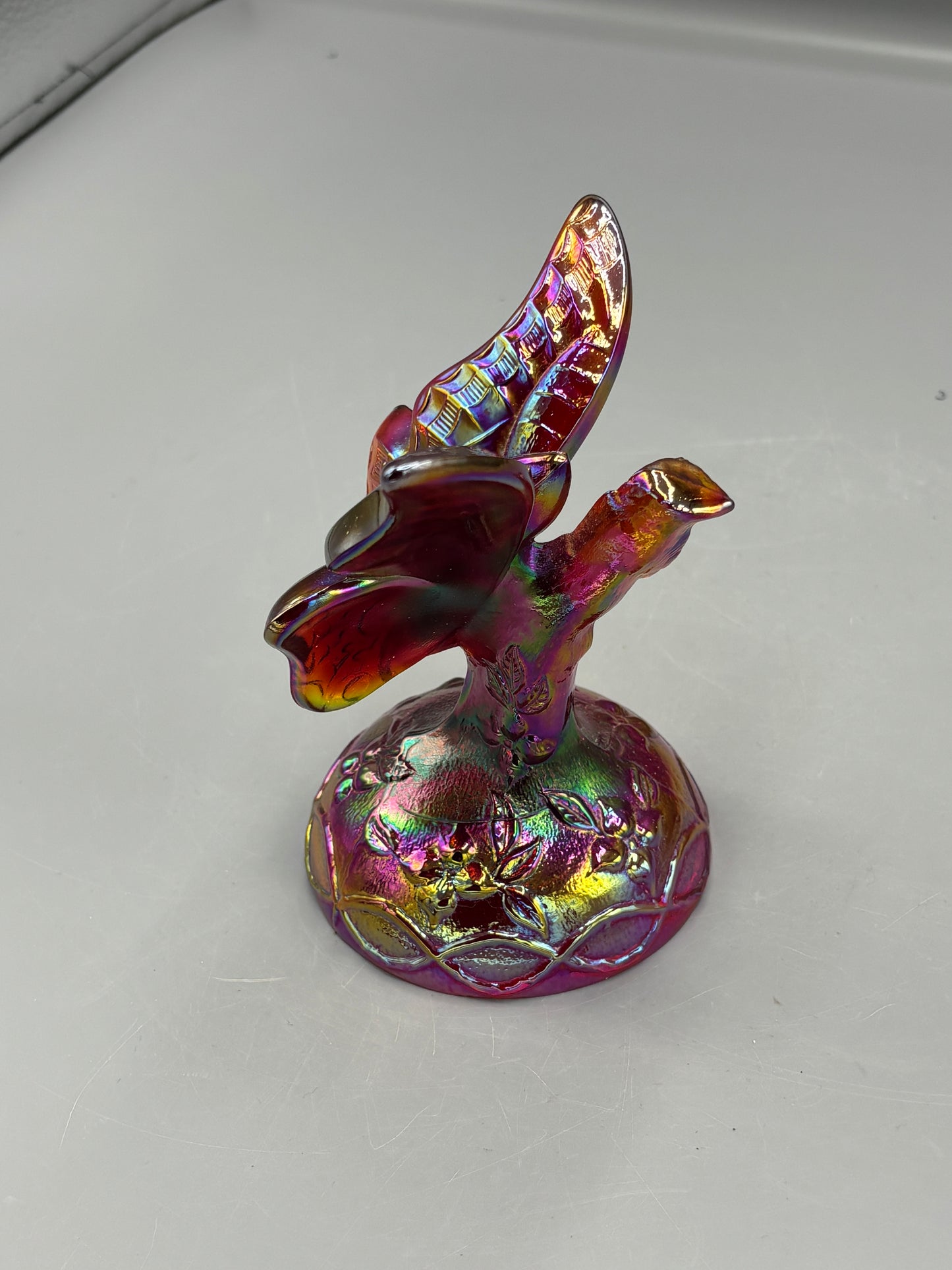 Vintage Fenton Ruby butterfly in a branch ring holder