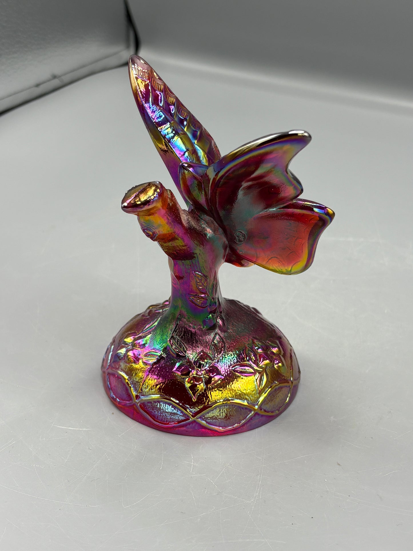 Vintage Fenton Ruby butterfly in a branch ring holder