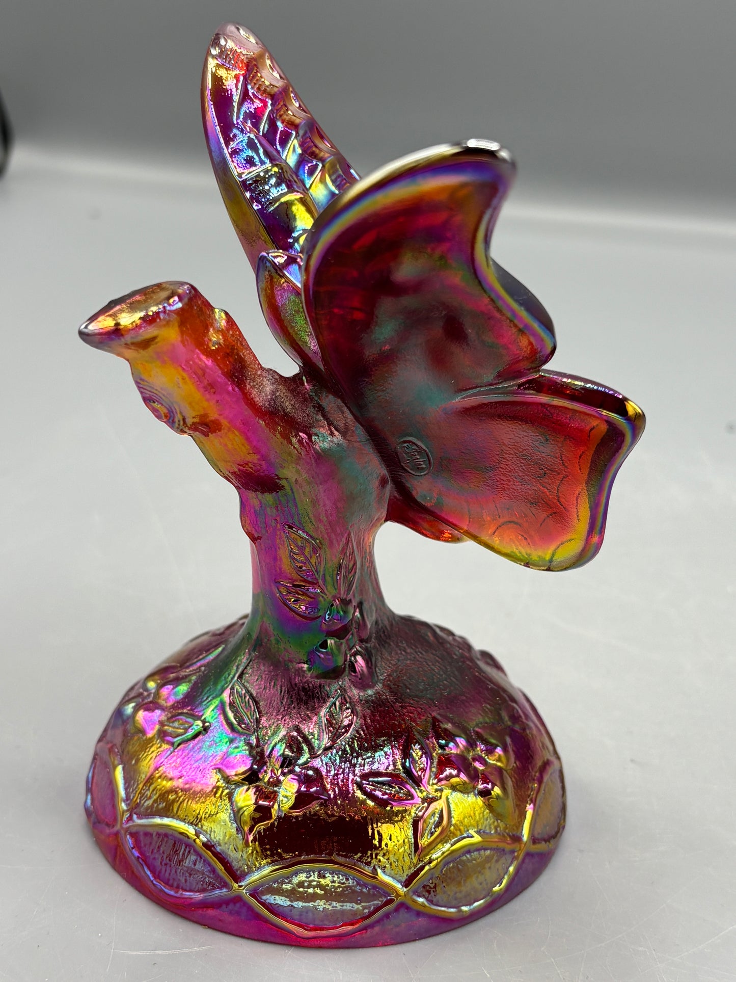 Vintage Fenton Ruby butterfly in a branch ring holder