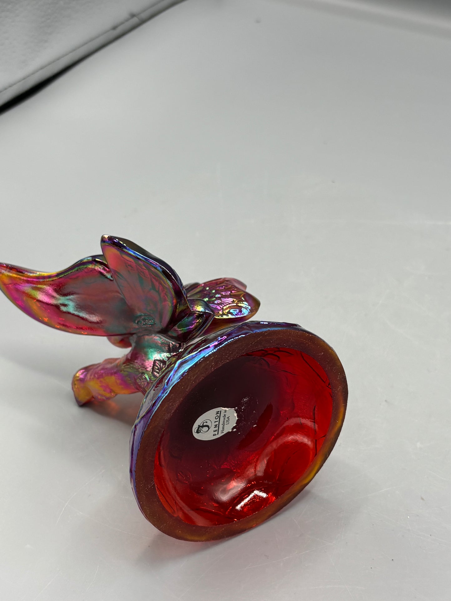 Vintage Fenton Ruby butterfly in a branch ring holder