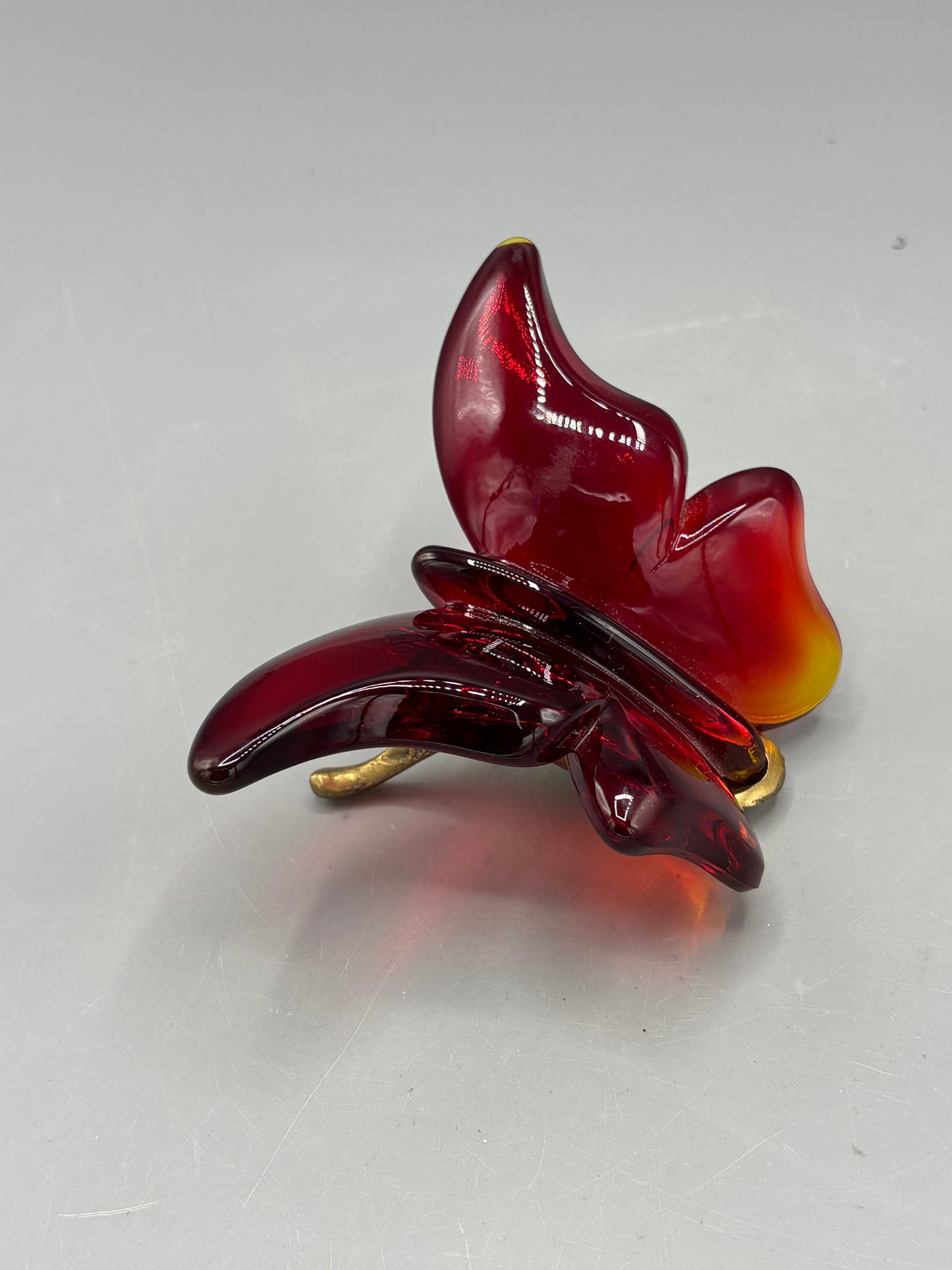 Vintage Amberina Fenton butterfly on Fenton brass stand