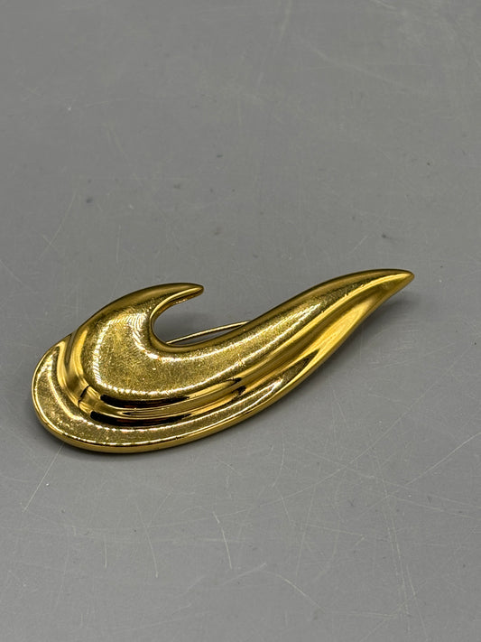 Vintage gold tone Swoosh style brooch