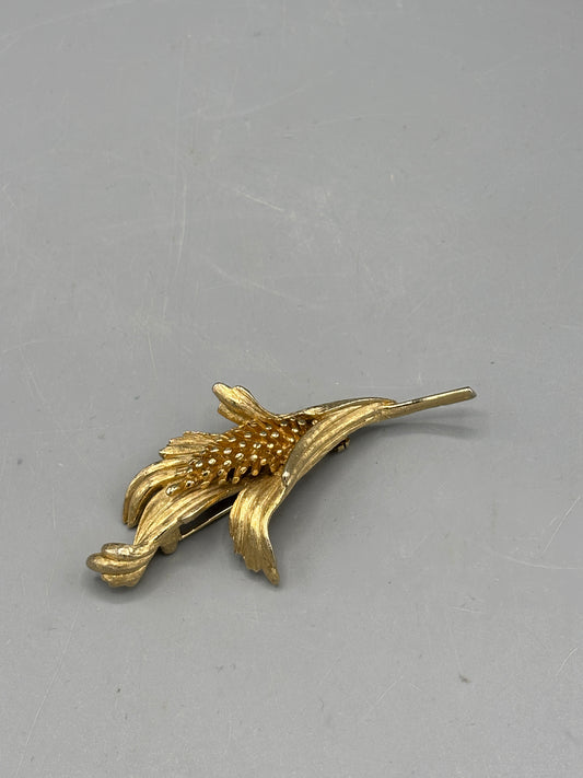 Vintage gold tone floral design