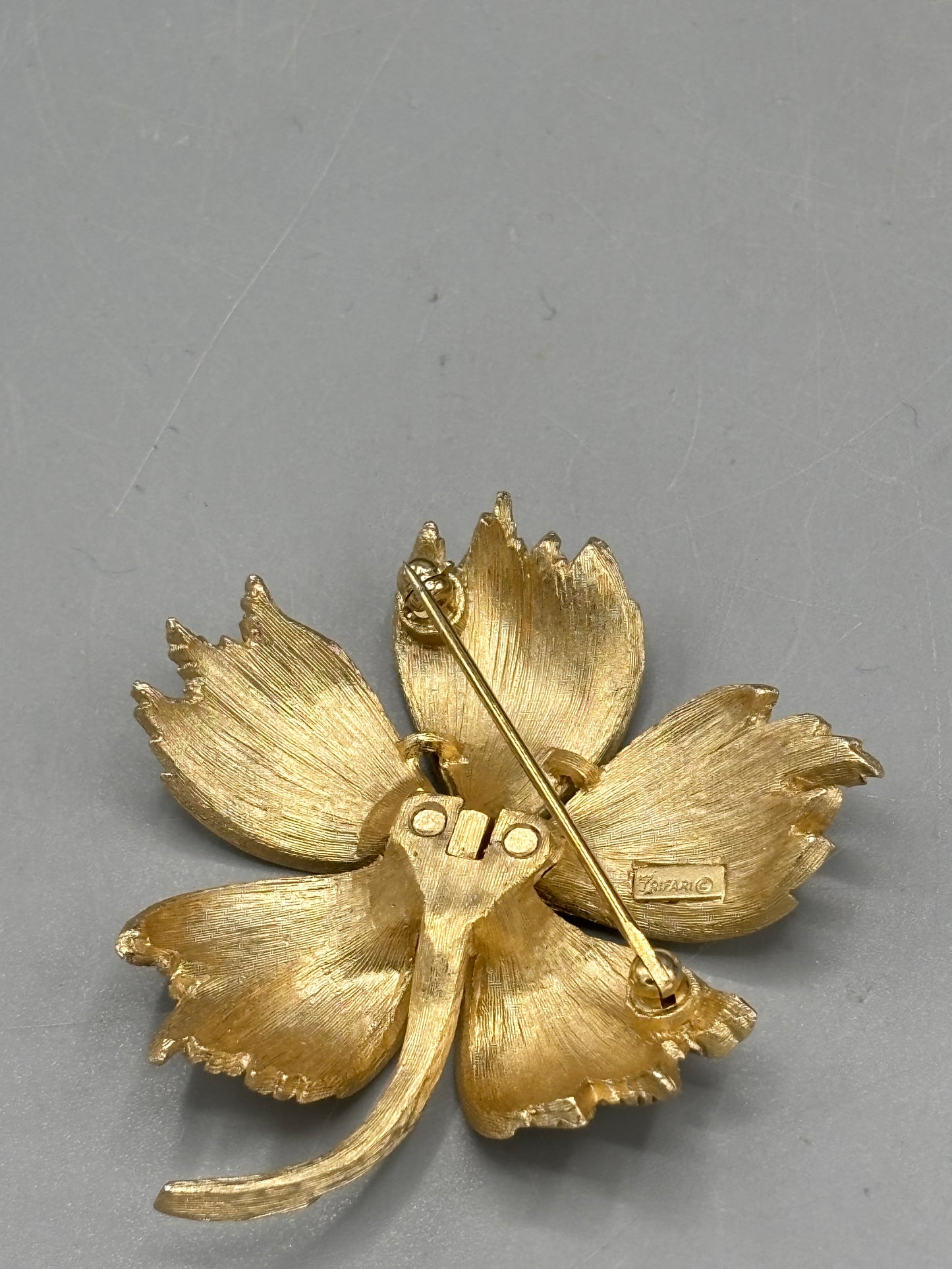 Vintage Crown Trifari gold tone leaf brooch