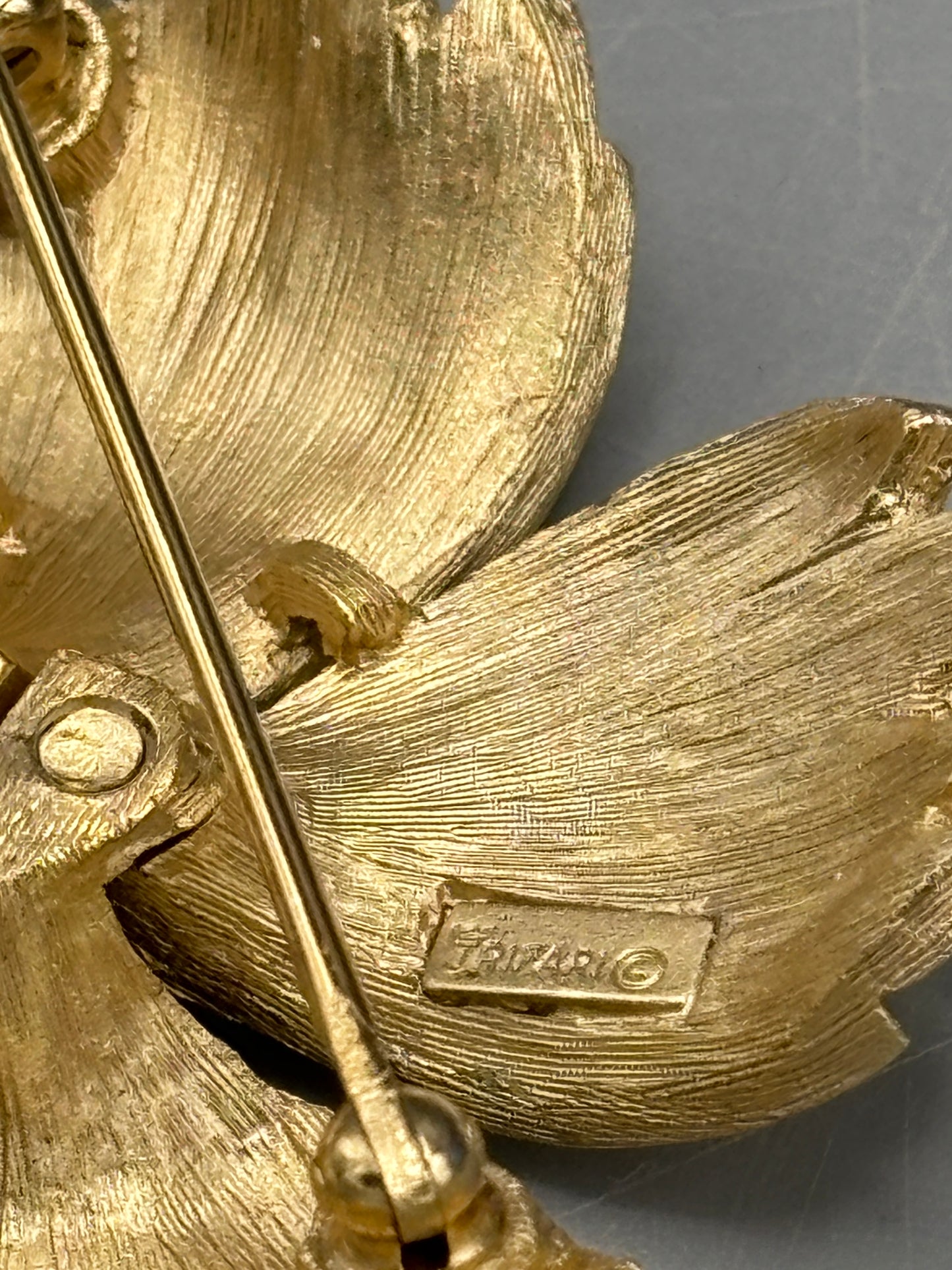 Vintage Crown Trifari gold tone leaf brooch